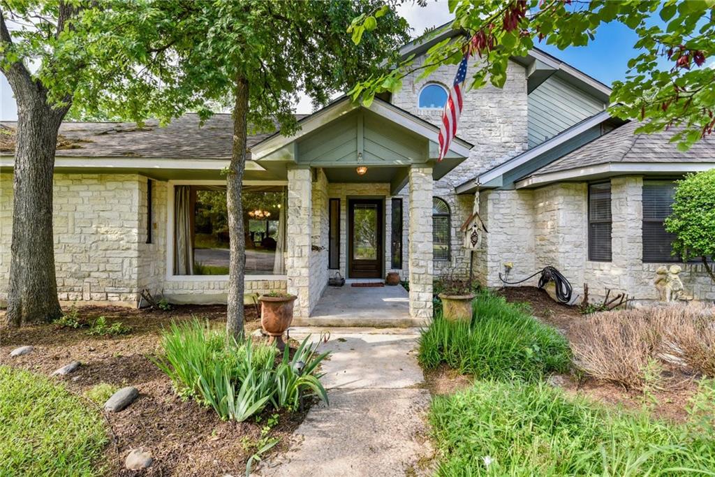 909 Dartmoor DR - front exterior - Luxury home in Camelot Sec 02, Austin, TX