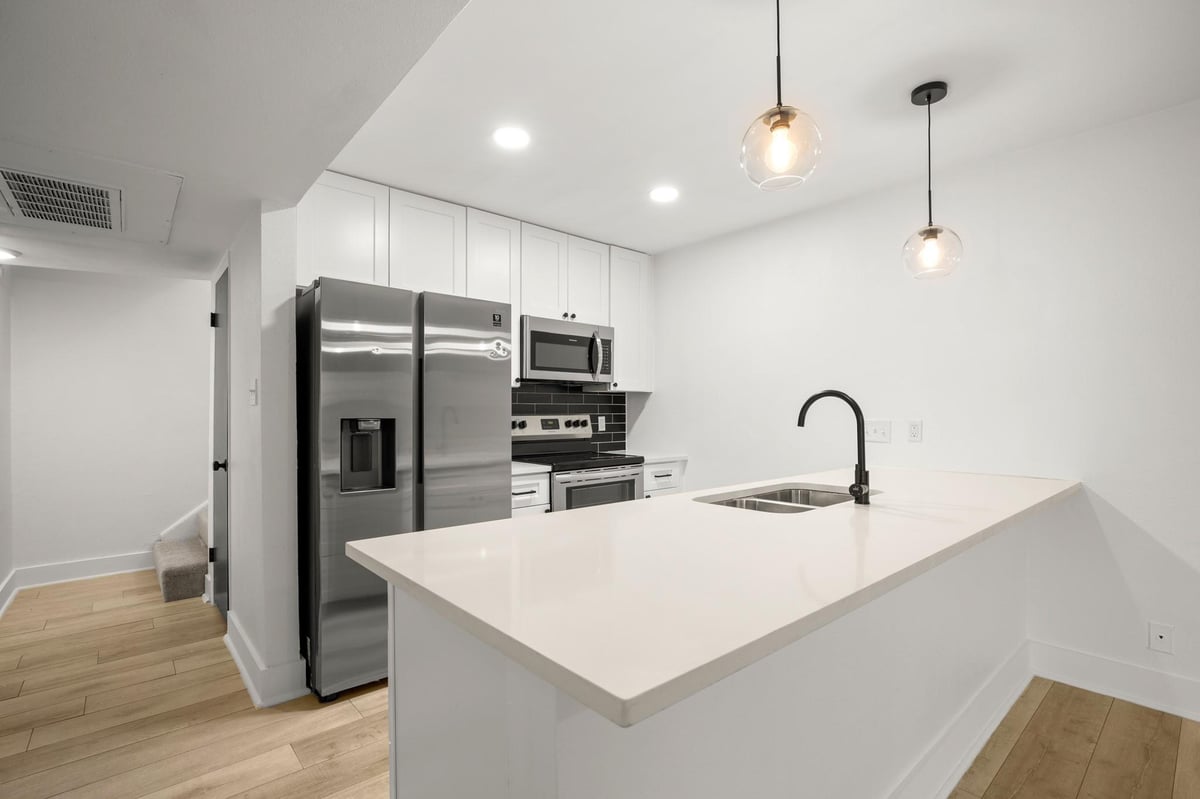Living area at 909 Reinli St Unit #103 - 3 bed 2 bath home