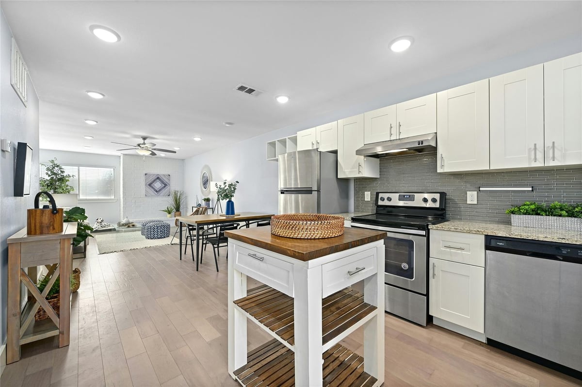 Kitchen at 909 Reinli St Unit #228 - 2 bed 2 bath home