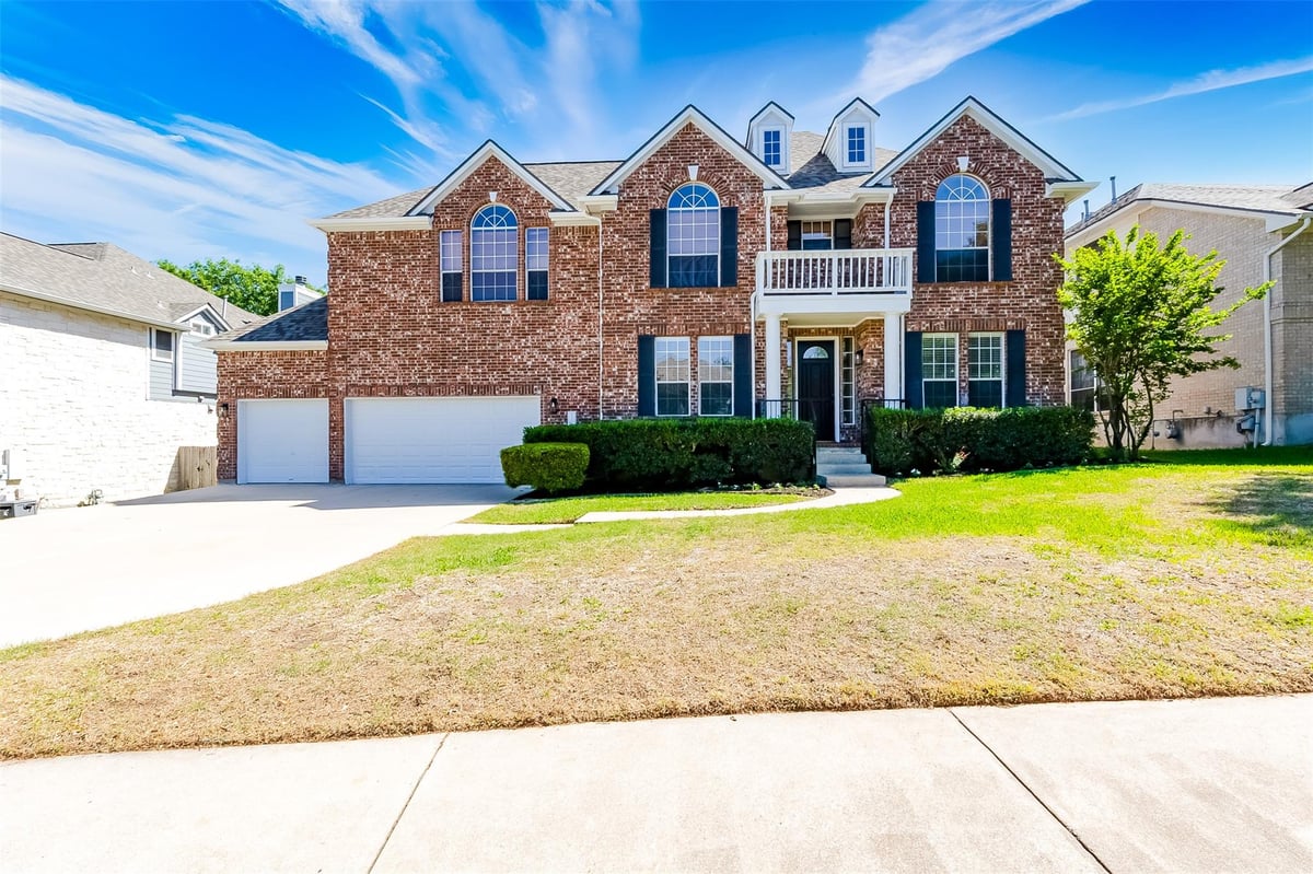 9105 Cottage Grove Pass - front exterior - Luxury home in Oak Brook Sec 1, Austin, TX