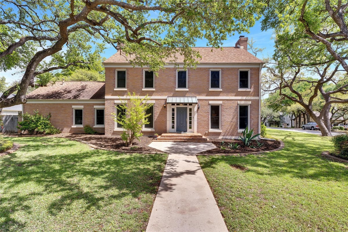 View 911 Ridgewood RD in Rollingwood Park 911 Ridgewood RD - property photo 1 - Luxury home in Rollingwood Park, Austin, TX