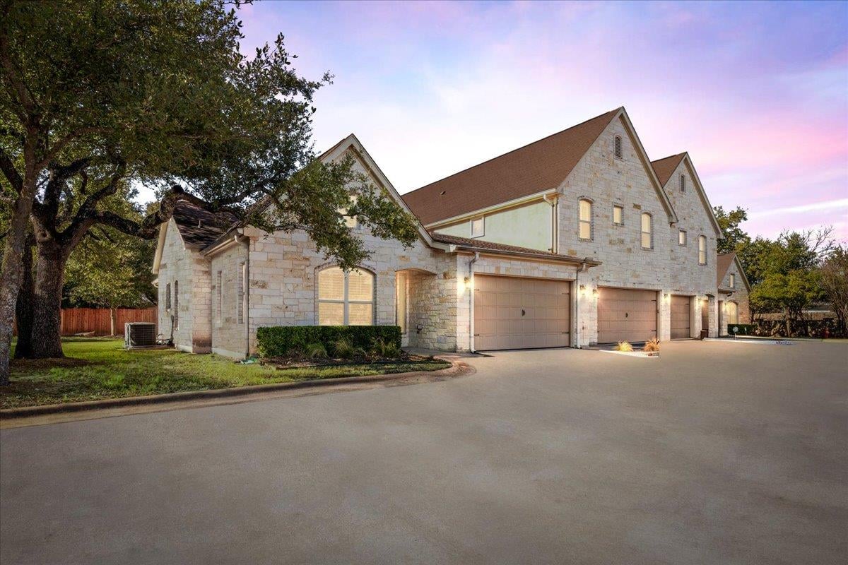 View 9122 Balcones Club Dr Unit #9 in Balcones Village Garden Homes 9122 Balcones Club Dr Unit #9 - front exterior - Luxury home in Balcones Village Garden Homes, Austin, TX