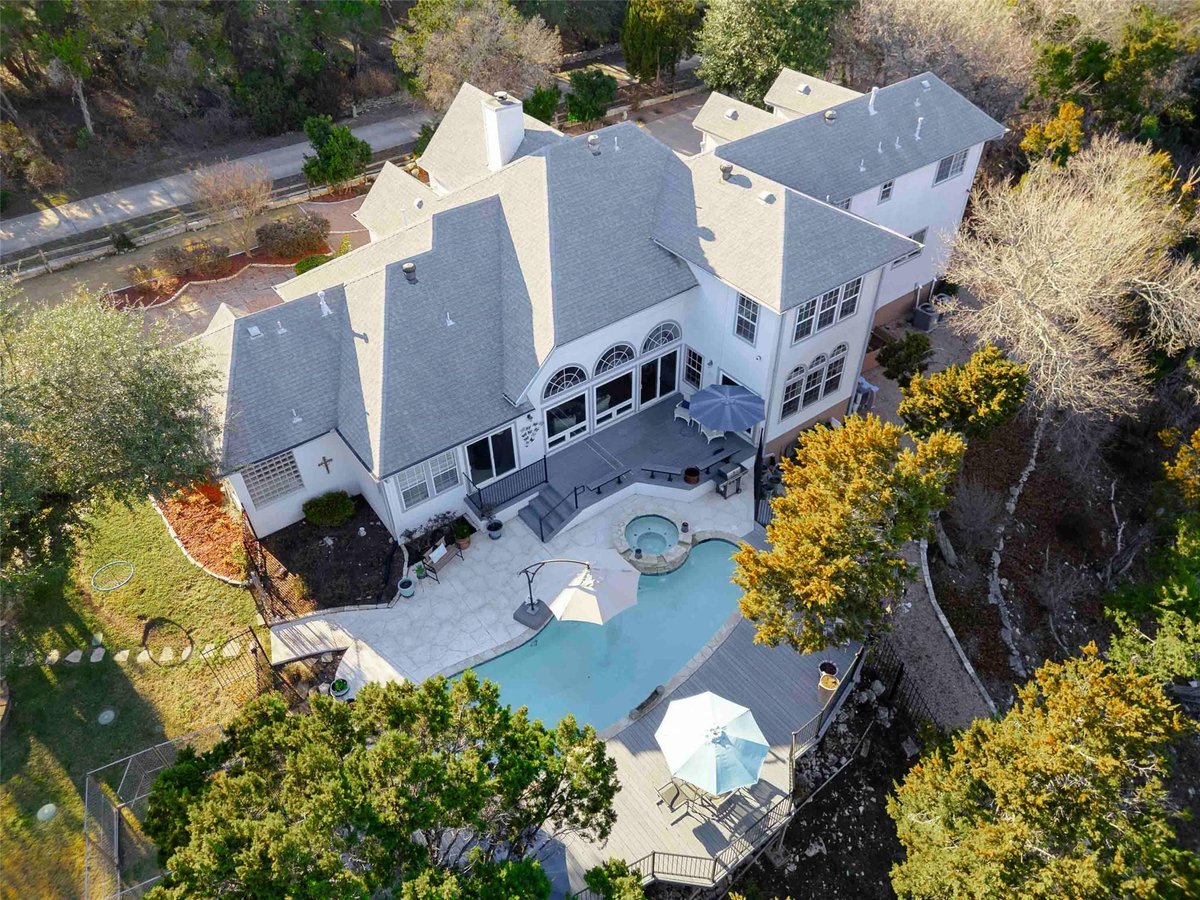 View 9201 SILVER PINE Cv in Crystal Mountain At Barton Creek Sec 01 9201 SILVER PINE Cv - front exterior - Luxury home in Crystal Mountain At Barton Creek Sec 01, Austin, TX