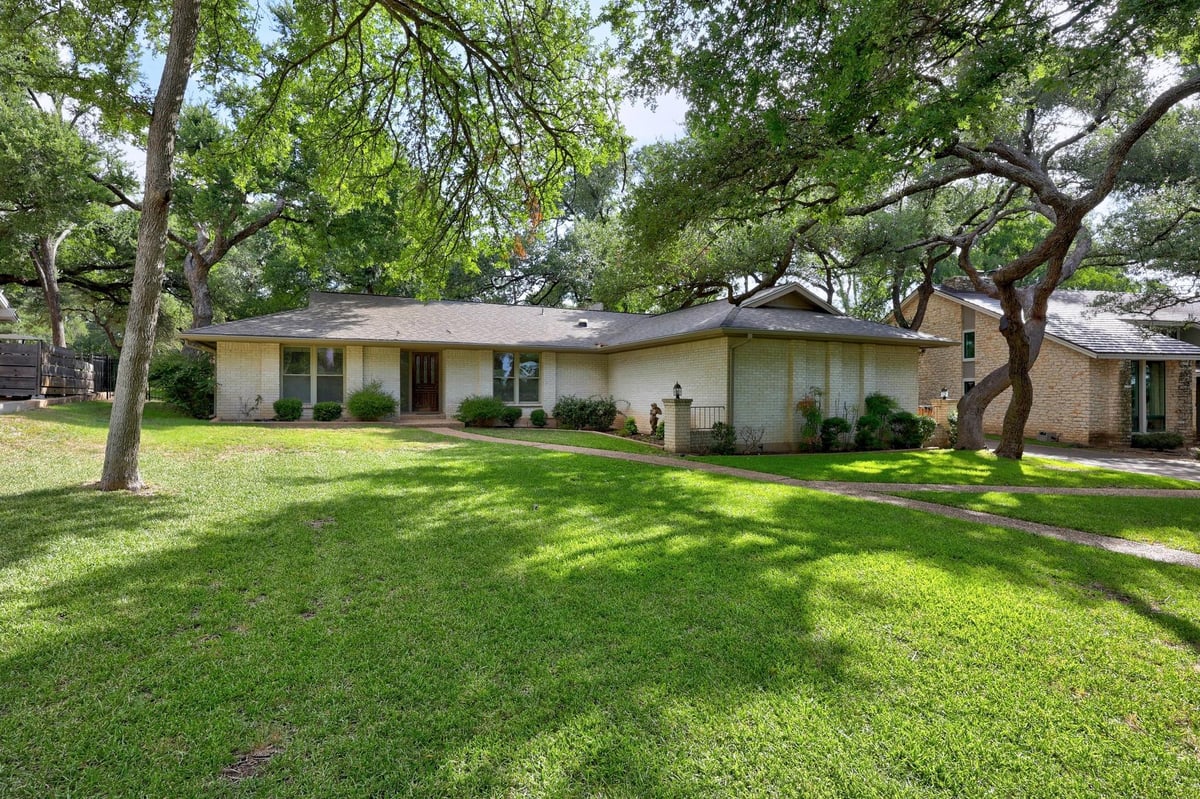 View 9202 Spring Hollow Dr in Balcones Village 9202 Spring Hollow Dr - front exterior - Luxury home in Balcones Village, Austin, TX