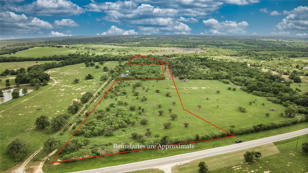 View 9296 Fm 713 in Moses Gage Surv A-8 9296 Fm 713 - front exterior - Luxury lot in Moses Gage Surv A-8, Dale, TX