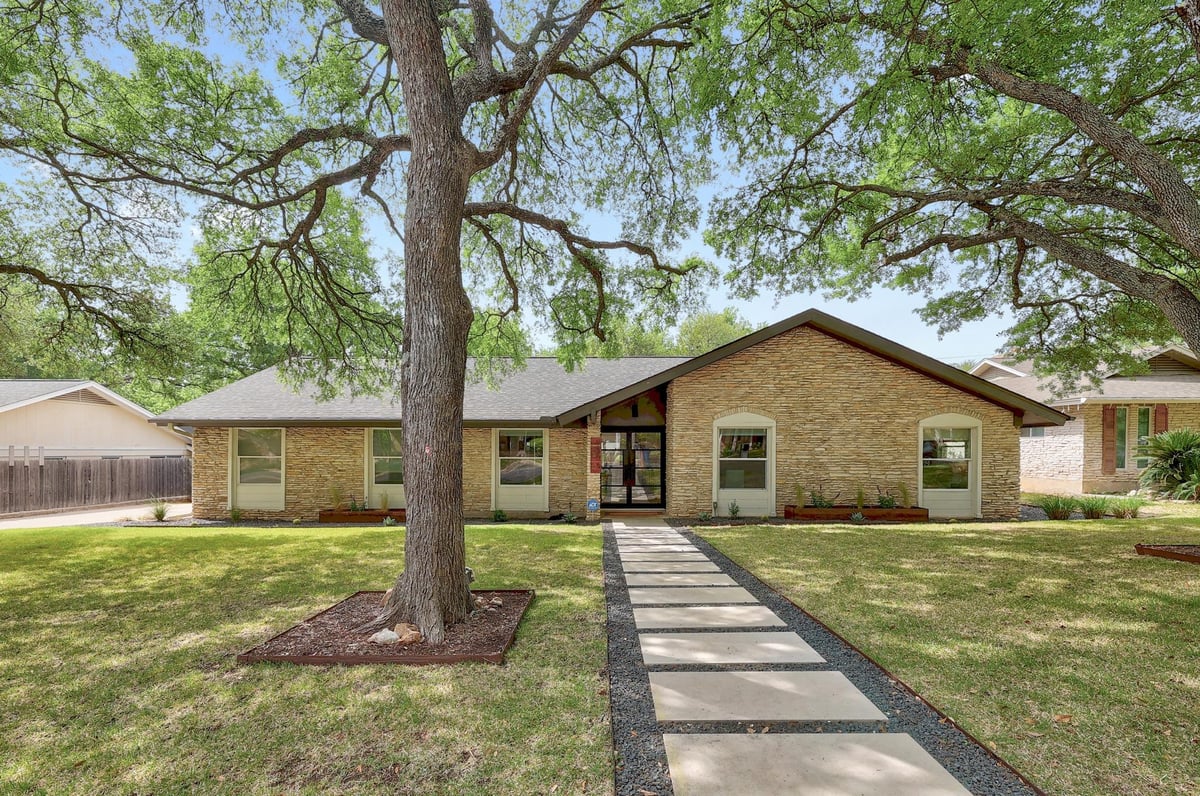 View 9305 Spring Hollow DR in Balcones Village Sec 05 Ph A 9305 Spring Hollow DR - front exterior - Luxury home in Balcones Village Sec 05 Ph A, Austin, TX