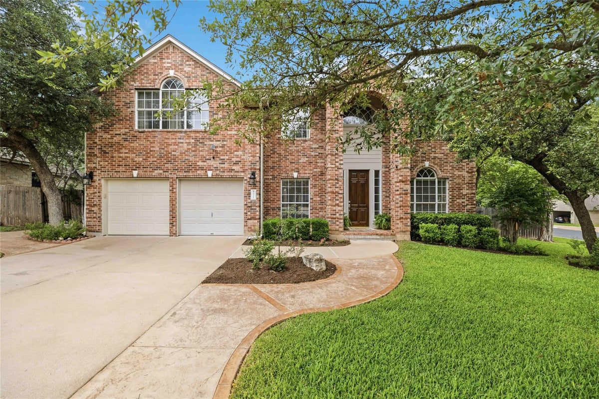 View 9308 Slate Creek in Oak Brook Sec 1 9308 Slate Creek - front exterior - Luxury home in Oak Brook Sec 1, Austin, TX