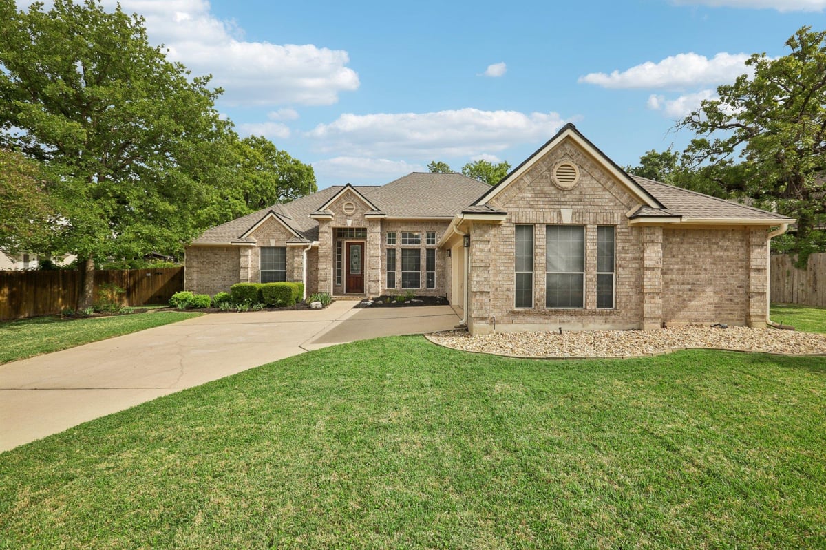 View 9309 Slate Creek Trl in Oak Brook Sec 01 9309 Slate Creek Trl - front exterior - Luxury home in Oak Brook Sec 01, Austin, TX