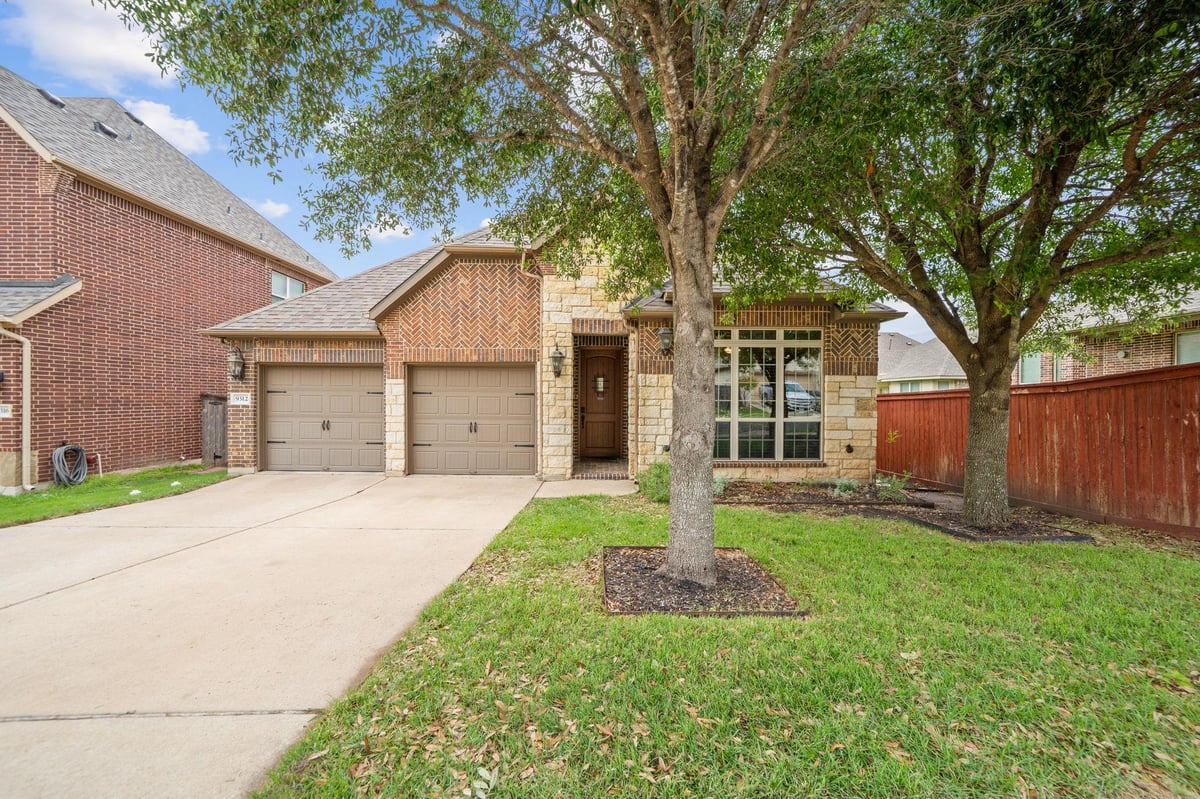 View 9312 Sydney Marilyn Ln in Reserve At Southpark Meadows 9312 Sydney Marilyn Ln - front exterior - Luxury home in Reserve At Southpark Meadows, Austin, TX