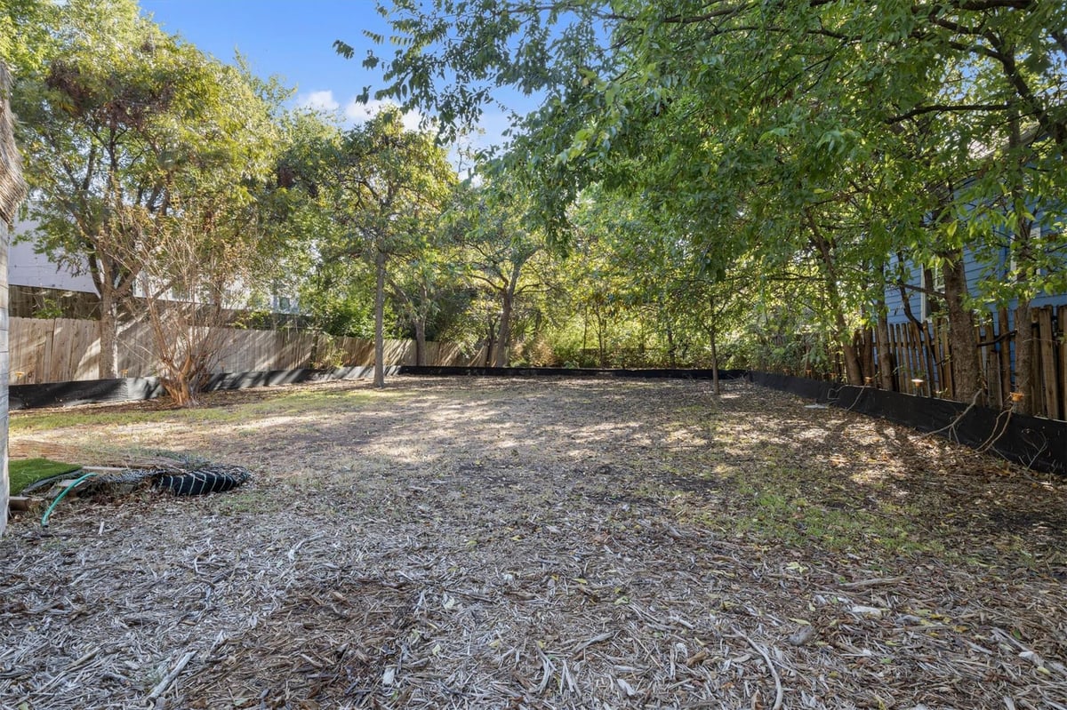 Primary bedroom at 935 E 56th St Unit #2 & 3 - Hill, Austin, TX