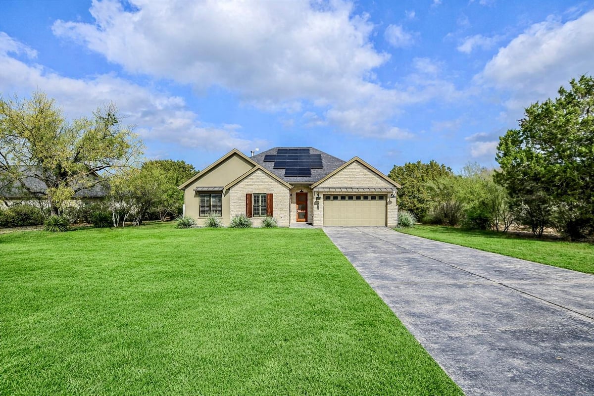 View 935 Wesley Ridge Dr in The Point At Ridge Harbor 935 Wesley Ridge Dr - front exterior - Luxury home in The Point At Ridge Harbor, Spicewood, TX