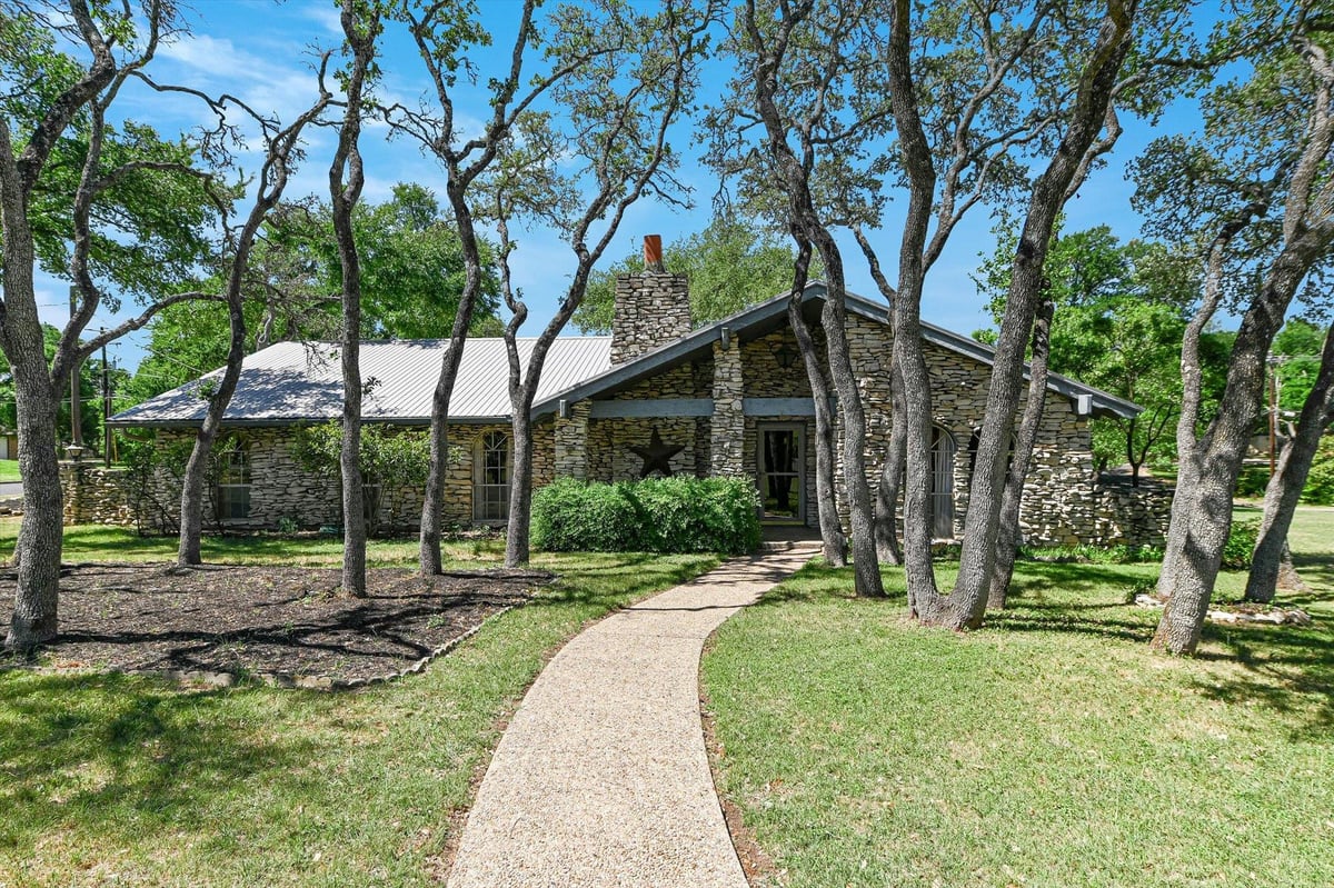 View 9401 Cedar Crest Dr in BALCONES VILLAGE SEC 5 PHS A 9401 Cedar Crest Dr - front exterior - Luxury home in BALCONES VILLAGE SEC 5 PHS A, Austin, TX