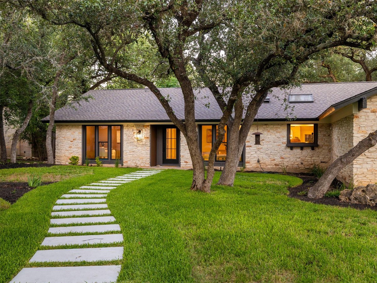 View 9403 Spring Hollow DR in Balcones Village Sec 06 9403 Spring Hollow DR - front exterior - Luxury home in Balcones Village Sec 06, Austin, TX