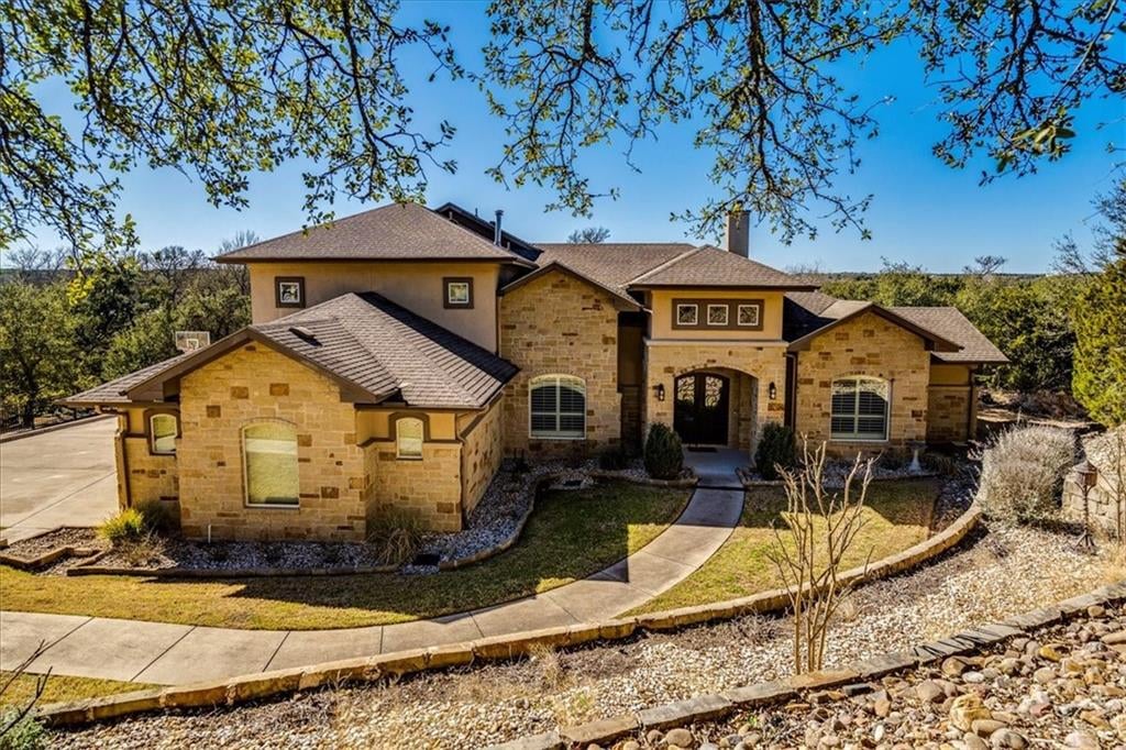 View 9410 Vera Cruz Rd in Granada Oaks 9410 Vera Cruz Rd - front exterior - Luxury home in Granada Oaks, Austin, TX