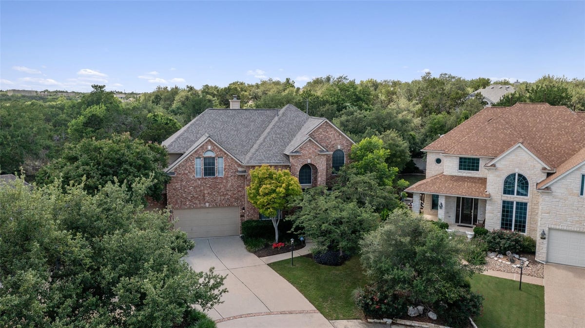 9500 CORBE Dr - front exterior - Luxury home in CANYON CREEK, Austin, TX