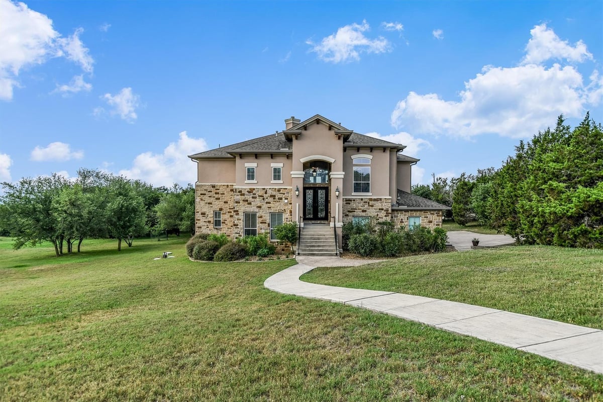 View 9501 Derecho Bnd in Southwest Hills Sec 04 9501 Derecho Bnd - front exterior - Luxury home in Southwest Hills Sec 04, Austin, TX