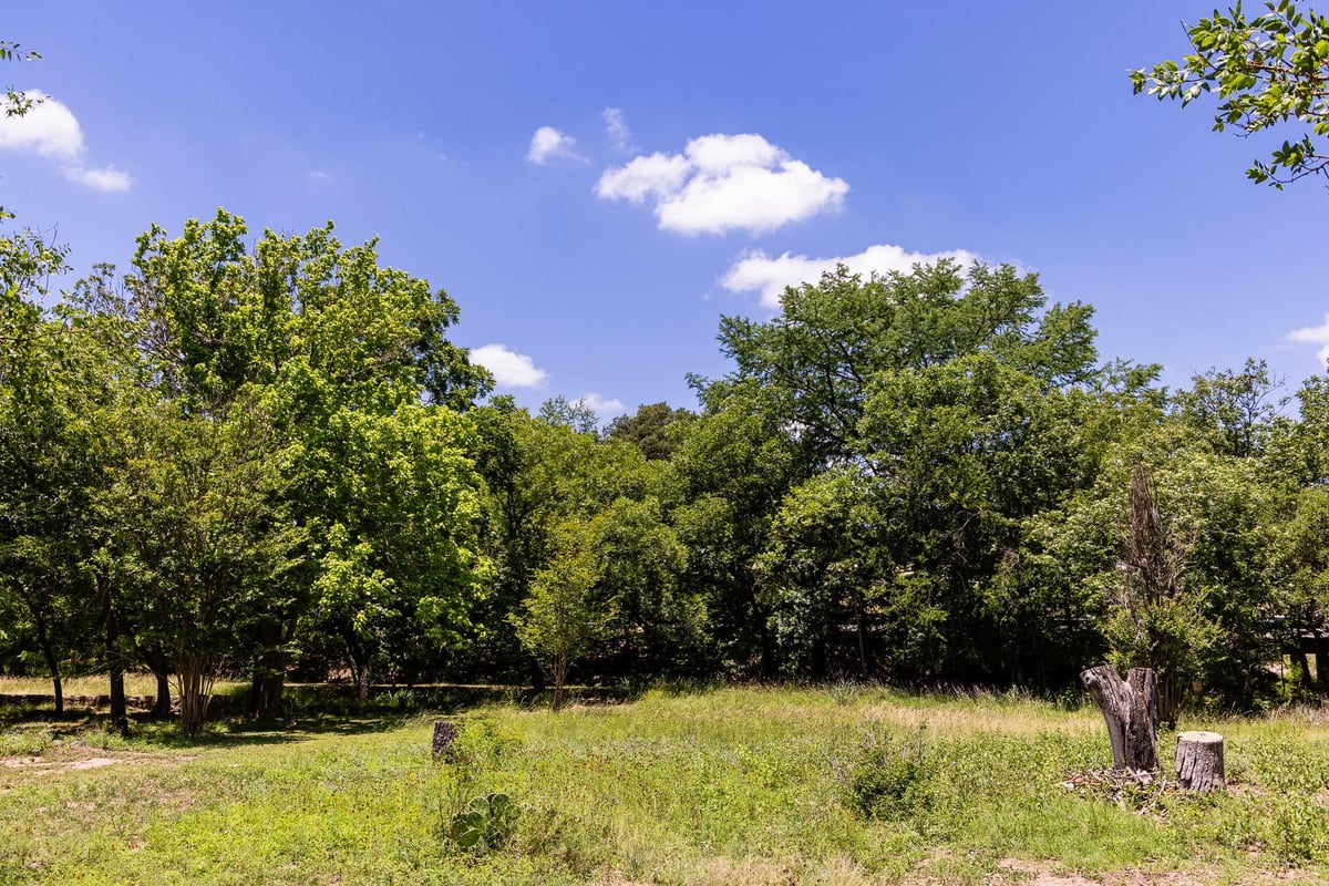 Primary bedroom at 951 Cypress Creek Rd - Kerrville, TX