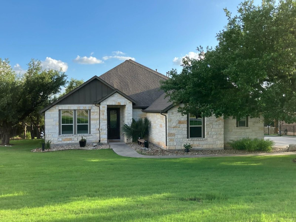 View 960 Blue Ridge DR in Counts Estates Ph Two Aka Butler Ranch Estates 960 Blue Ridge DR - front exterior - Luxury home in Counts Estates Ph Two Aka Butler Ranch Estates, Dripping Springs, TX