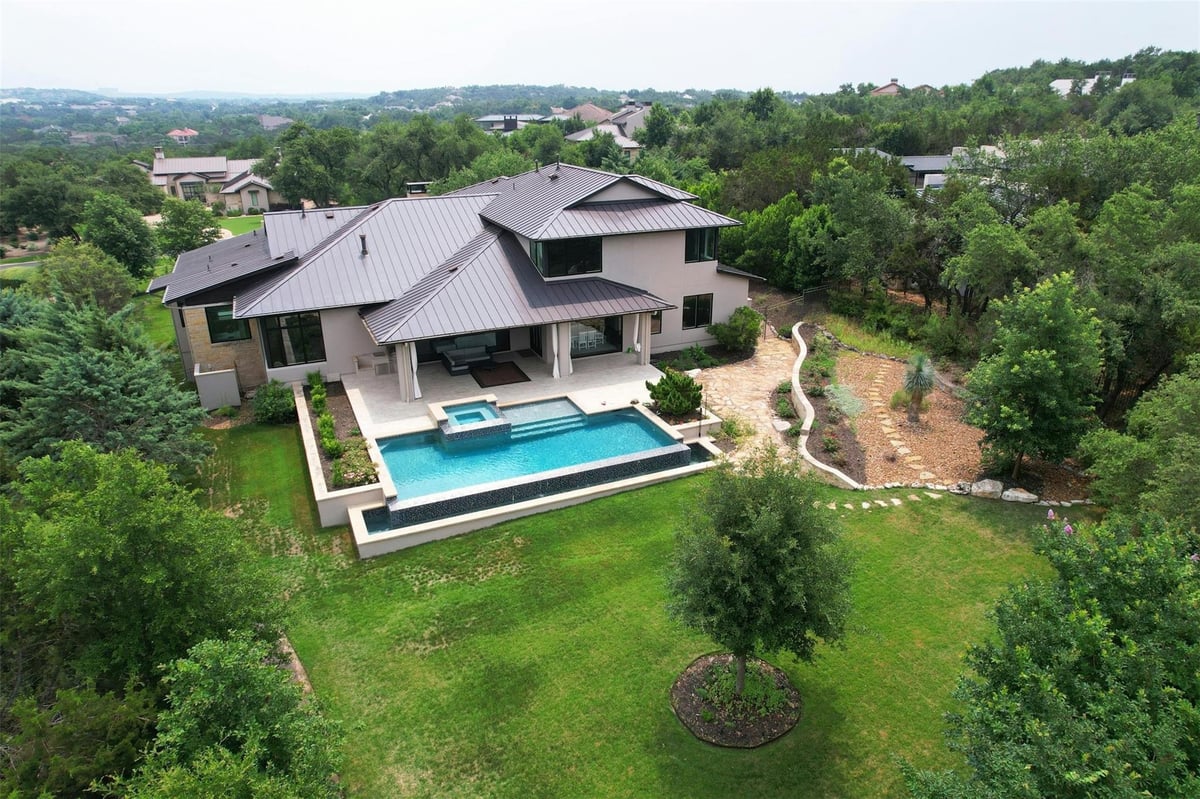 View 9604 Veletta PL in Barton Creek Ph 04 Sec H 9604 Veletta PL - front exterior - Luxury home in Barton Creek Ph 04 Sec H, Austin, TX