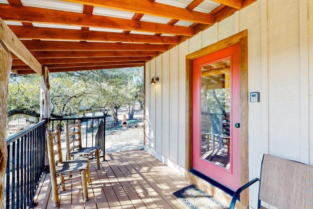 Primary bedroom at 961 Buttercup Ln - Texas Central Railway Co Surv, Wimberley, TX