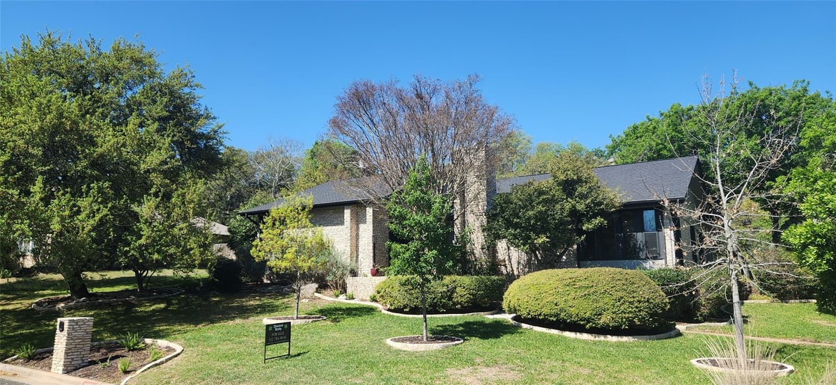 View 9610 Vista View DR in Spicewood At Balcones Villages 9610 Vista View DR - front exterior - Luxury home in Spicewood At Balcones Villages, Austin, TX