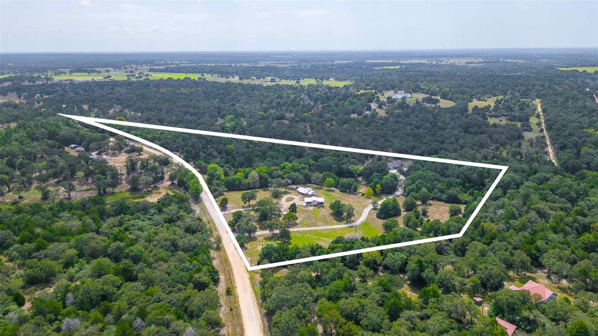 View 9695 County Road 321 in Benton Schulze Properties 9695 County Road 321 - front exterior - Luxury home in Benton Schulze Properties, Caldwell, TX