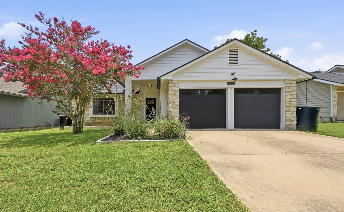 View 9706 Woodshire DR in Tanglewood Forest Sec 02 Ph A 9706 Woodshire DR - front exterior - Luxury home in Tanglewood Forest Sec 02 Ph A, Austin, TX