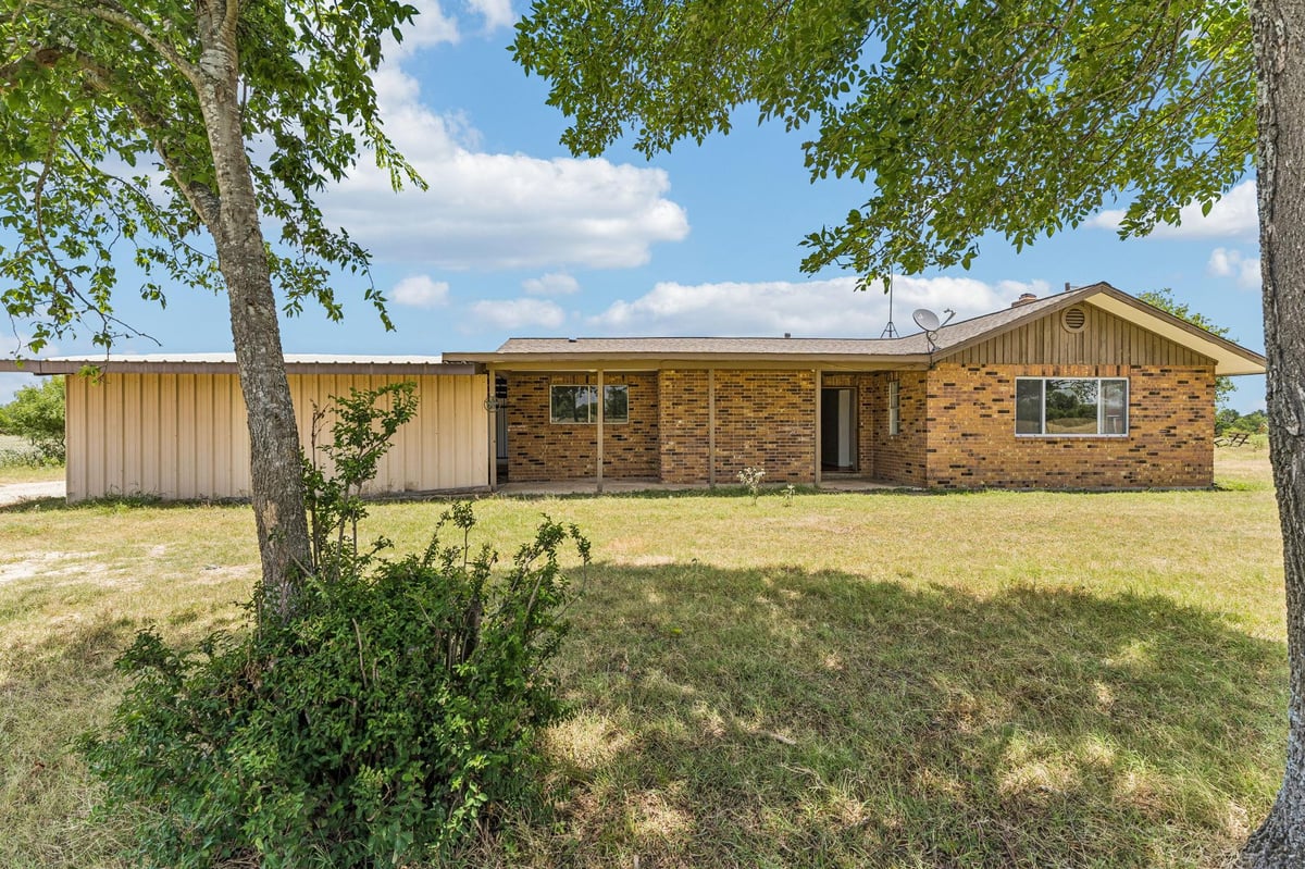 View 9765 State Park RD in N/A 9765 State Park RD - property photo 1 - Luxury home in N/A, Lockhart, TX