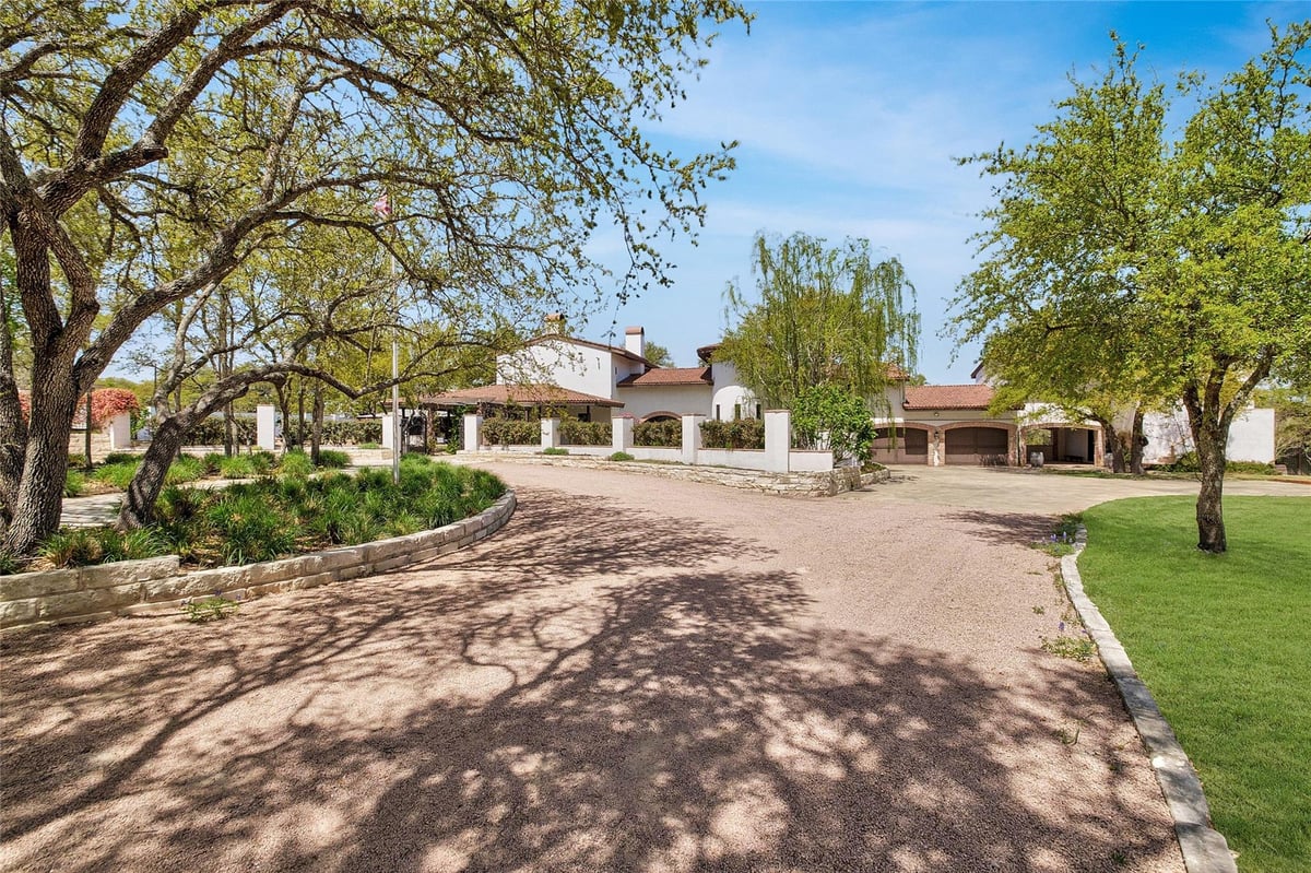 View 9770 FM 967 in Thomas @ Moore & C Wilhelm 9770 FM 967 - front exterior with 9770 FM 967 in Buda - Luxury home in Thomas @ Moore & C Wilhelm, Buda, TX