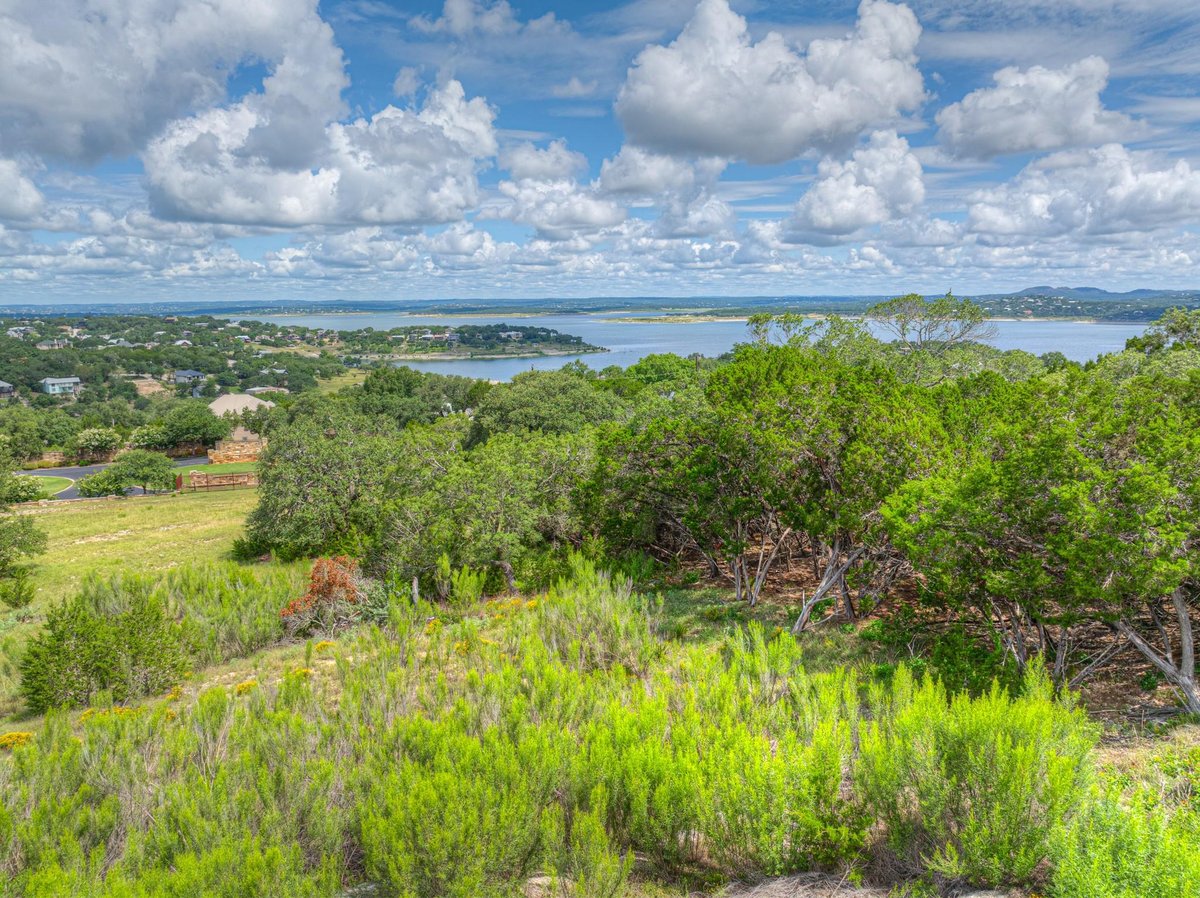 View 980 El Capitan Trl in First Mountain 980 El Capitan Trl - front exterior - Luxury lot in First Mountain, Canyon Lake, TX