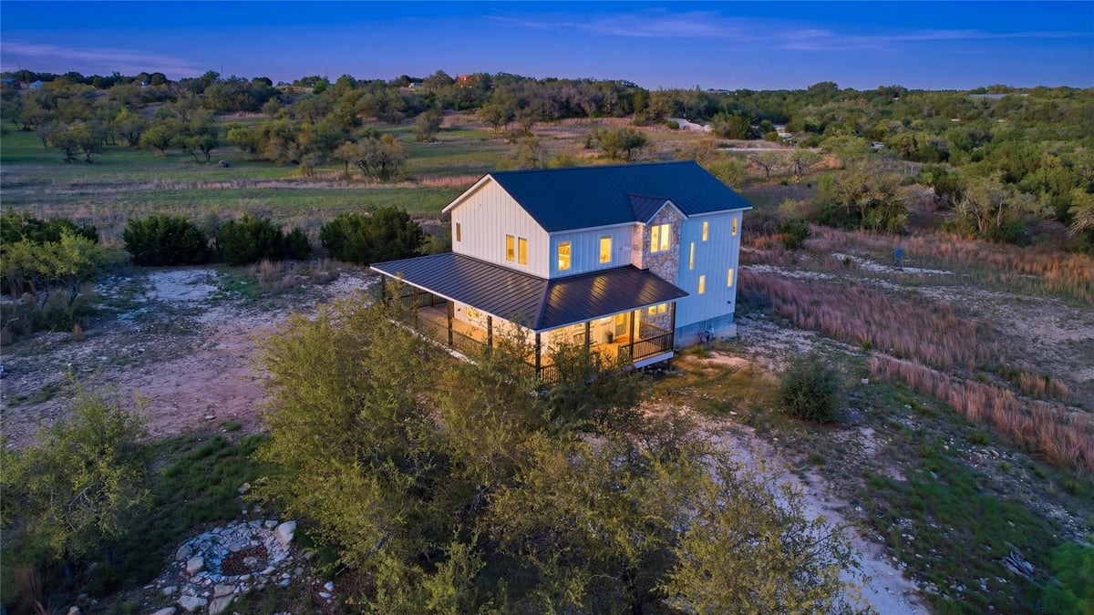 View 980 Sycamore Creek Dr in Creekside Addition 980 Sycamore Creek Dr - front exterior - Luxury home in Creekside Addition, Dripping Springs, TX