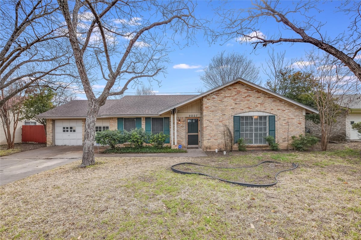 View 9807 Kendal Dr in Windsor Hills Sec 01 9807 Kendal Dr - front exterior - Luxury home in Windsor Hills Sec 01, Austin, TX