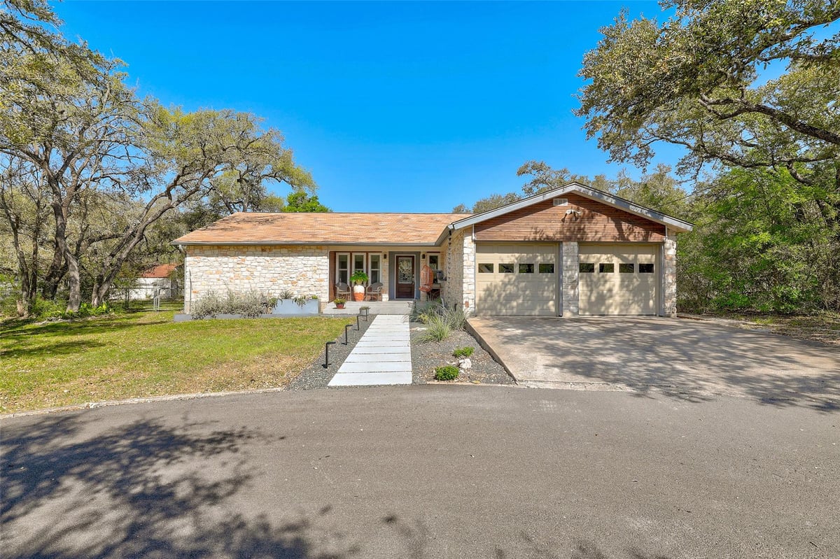 View 9831 Weir Loop Circle Cir in Geneva Estates 9831 Weir Loop Circle Cir - front exterior - Luxury home in Geneva Estates, Austin, TX