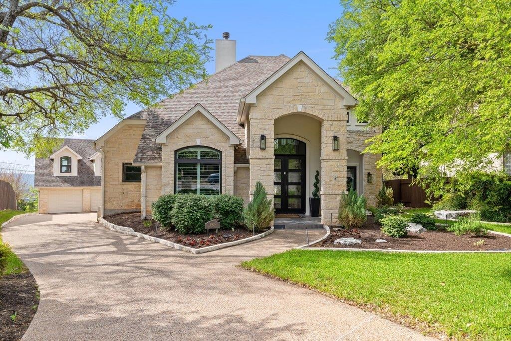 9905 Charthouse Cv - front exterior - Luxury home in River Place Sec 07B, Austin, TX