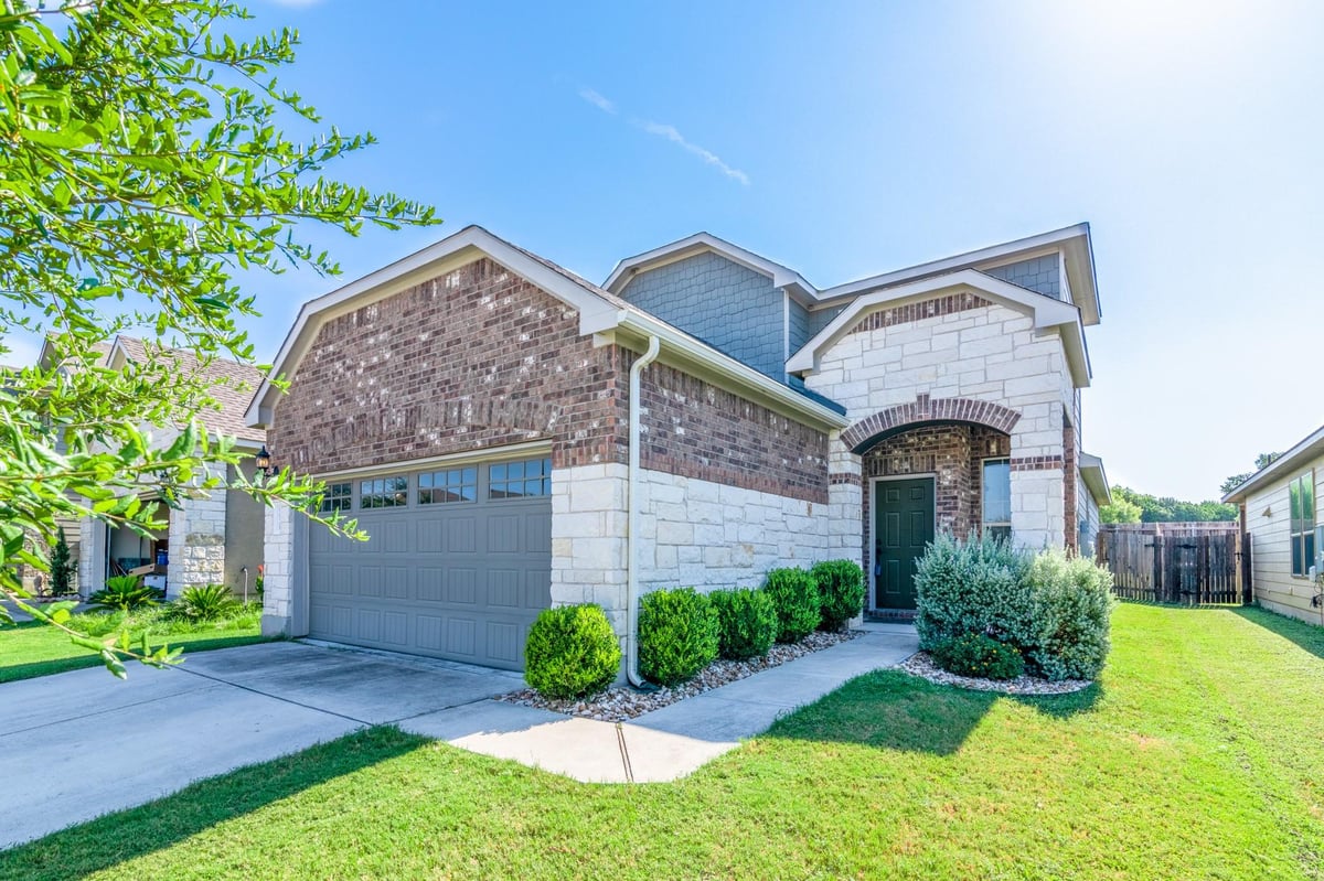 View 9921 Aly May Dr in Hollow At Slaughter Creek Sec 9921 Aly May Dr - front exterior - Luxury home in Hollow At Slaughter Creek Sec, Austin, TX