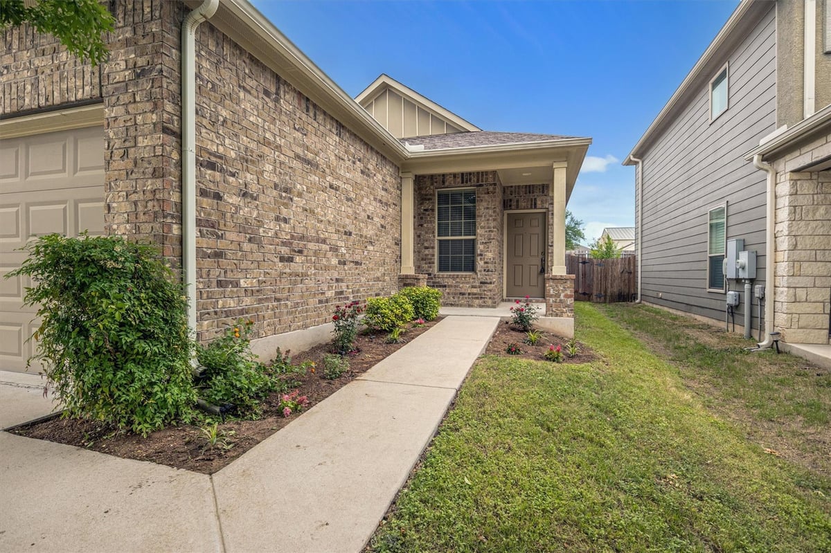 View 9937 Aly May Dr in Hollow At Slaughter Creek Sec 9937 Aly May Dr - front exterior - Luxury home in Hollow At Slaughter Creek Sec, Austin, TX