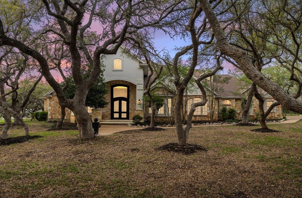 999 Enchanted Oaks Dr - front exterior - Luxury home in Onion Creek Ranch Sub, Driftwood, TX