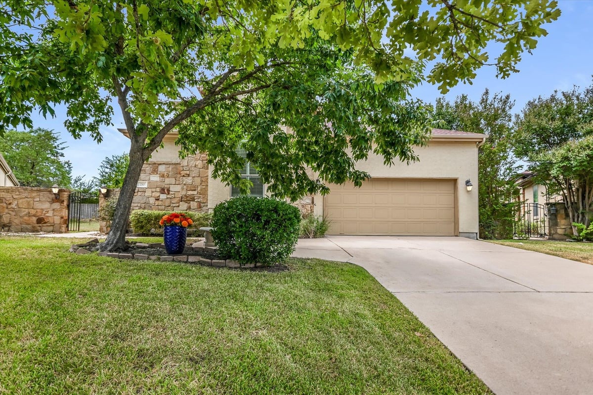View 210 Rivulet LN in Yaupon Creek Sec 01 Amd Lakeway 210 Rivulet LN - front exterior - Luxury home in Yaupon Creek Sec 01 Amd Lakeway, Austin, TX