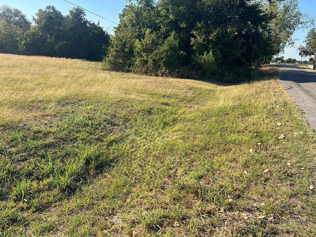 View Lot 1 Block 4 W Bell ST in J410335I - BARTLETT CITY Lot 1 Block 4 W Bell ST - front exterior - Luxury lot in J410335I - BARTLETT CITY, Bartlett, TX
