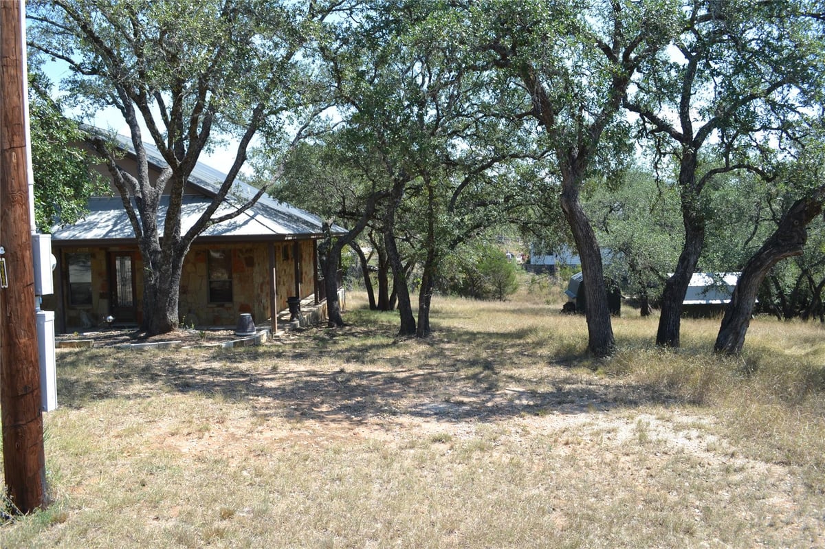 View LOT 307 Rolling Hills Dr in Lakeside Beach LOT 307 Rolling Hills Dr - front exterior - Luxury lot in Lakeside Beach, Spicewood, TX