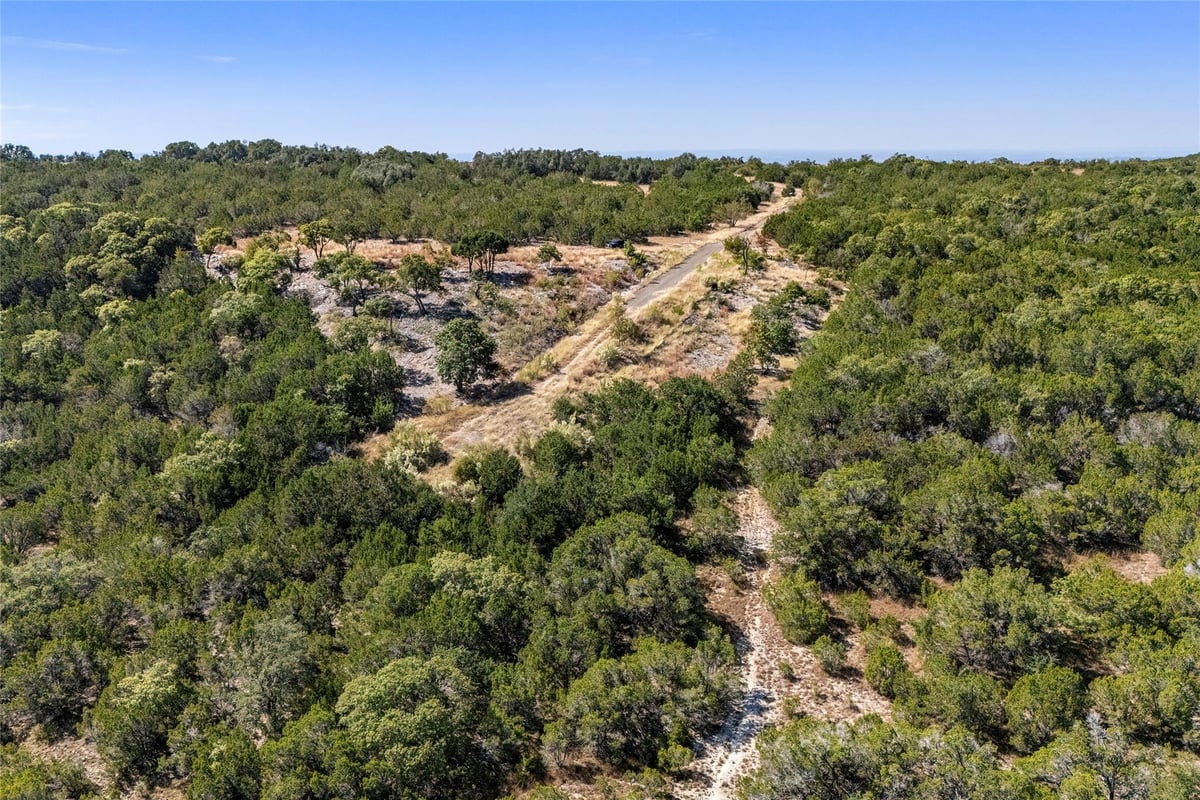 View Lots 196-a, 198-a, 201-a Canyon Ridge Ct in Whitewater Spgs Lots 196-a, 198-a, 201-a Canyon Ridge Ct - front exterior - Luxury lot in Whitewater Spgs, Bertram, TX