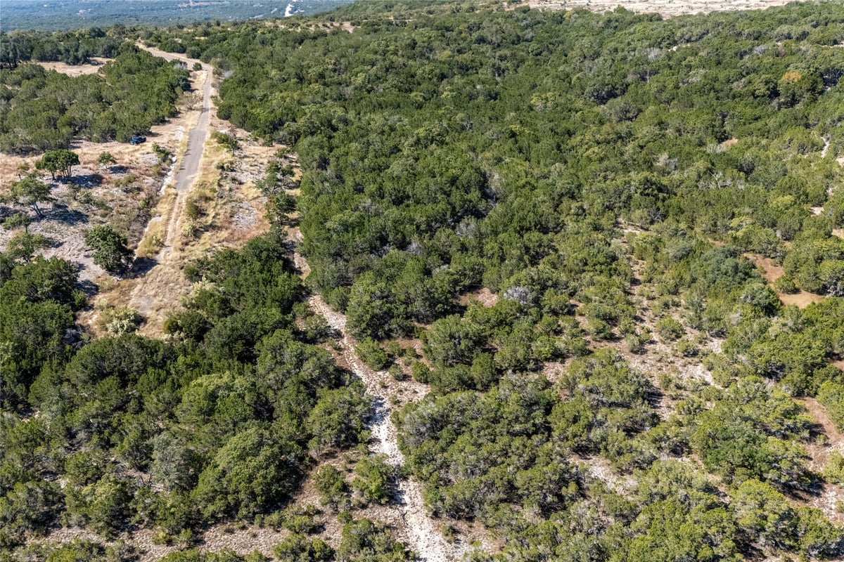 Primary bedroom at Lots 198-A & 201-A Canyon Ridge Ct - Whitewater Spgs, Bertram, TX