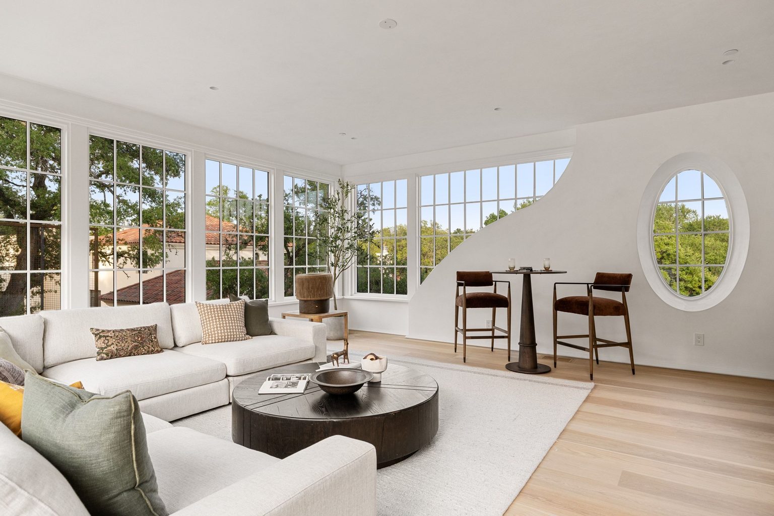 Luxury Austin home interior with architectural round window