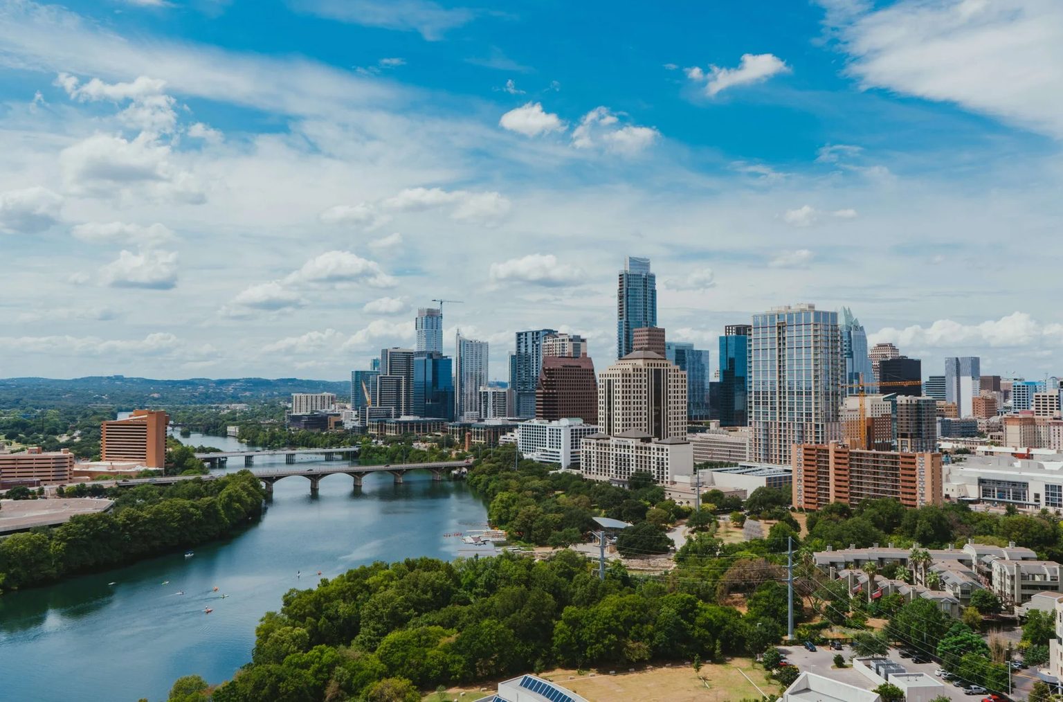 Downtown Austin skyline over Lady Bird Lake for Keenan Group client reviews
