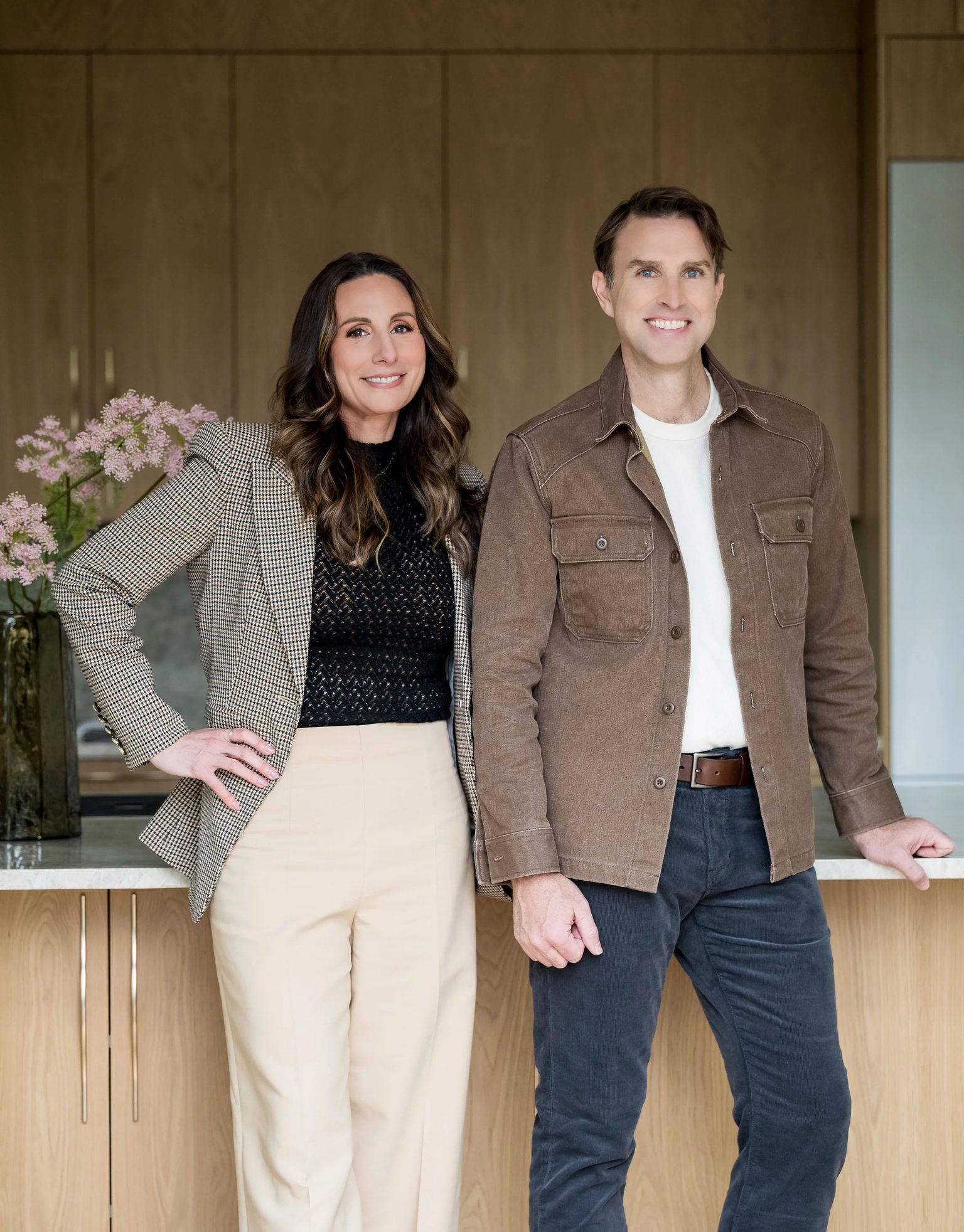 Joe and Cara Keenan standing at a kitchen island
