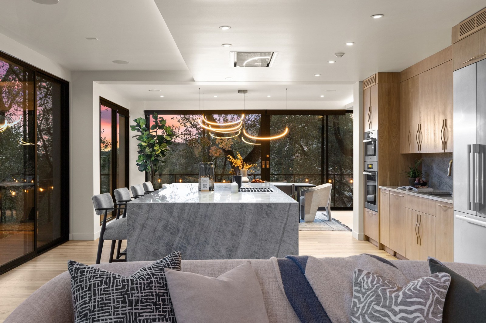 Renovated kitchen and dining area overlooking the living space at 6109 Mountain Villa Circle