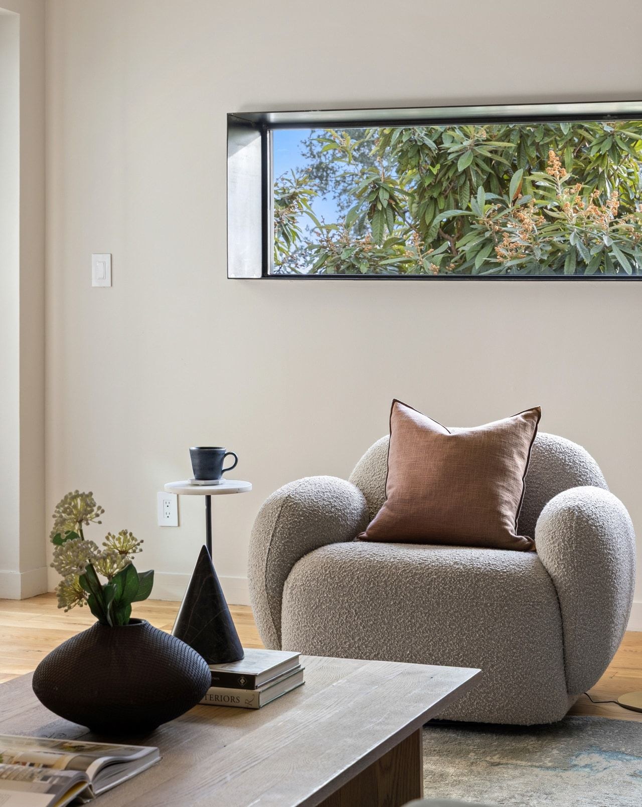 Sitting area with warm modern furnishings inside the restored Taniguchi residence