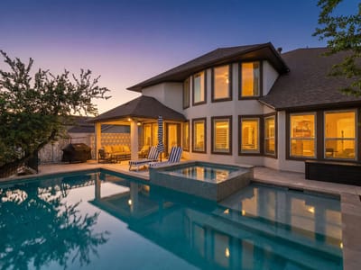 Backyard with pool and spa and twilight outdoor living at 15504 Cabrillo Way - 4 bed 3 bath home