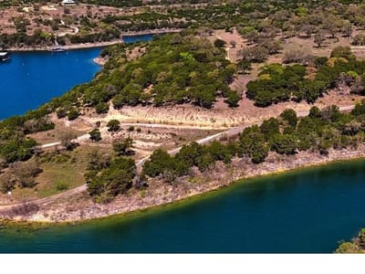 Aerial view with waterfront peninsula property at 0 Lohman Ford Rd - ABS 207 SUR 740 COX B F ACR 315.3630 [1-D-1], Lago Vi...