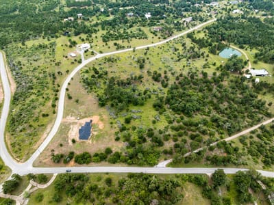 Primary bedroom at 000 McAllister Rd - Ashland Pines, Bastrop, TX